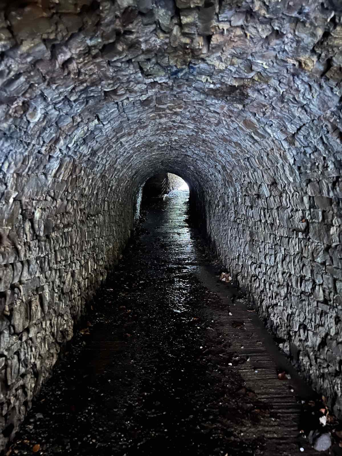 The wet stone tunnel on the race route